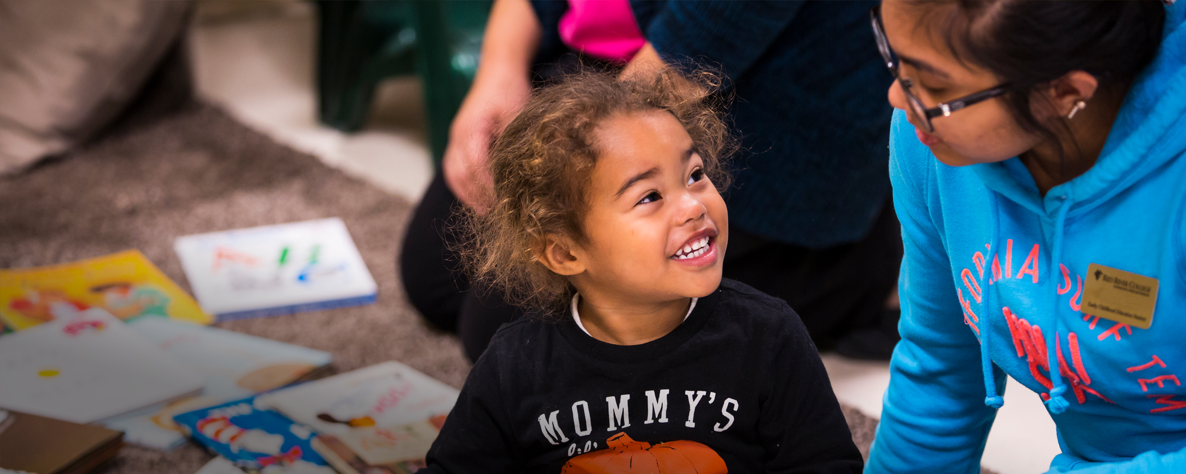 Child and early childhood educator in daycare