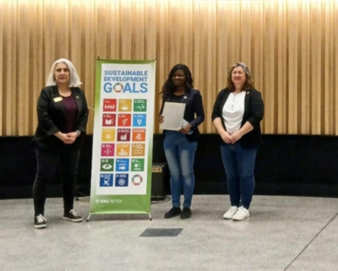 From left: Maria Mendes, Director of Environmental Stewardship and Campus Renewal, Tosin Adewumi, winner of the Top Academic Assignment, and Kathleen Tiede from event sponsor Crosier Kilgour
